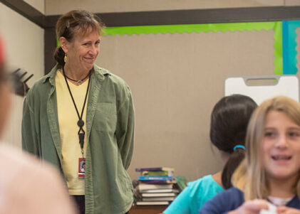 Libby Parsley a teacher in her classroom with students